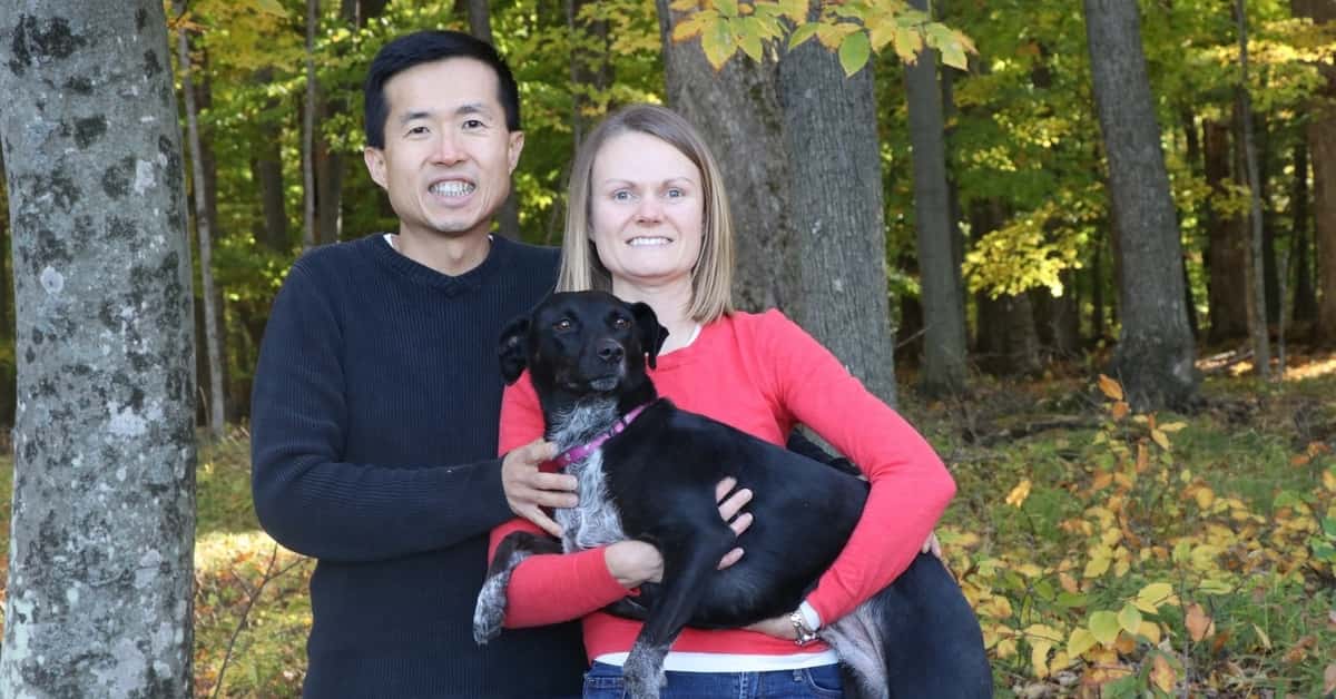 Dr. Wei-Chuan Wang of BayCare Clinic poses with his wife and dog