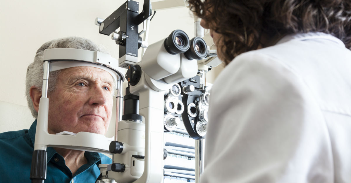 Man having eyes examined by doctor