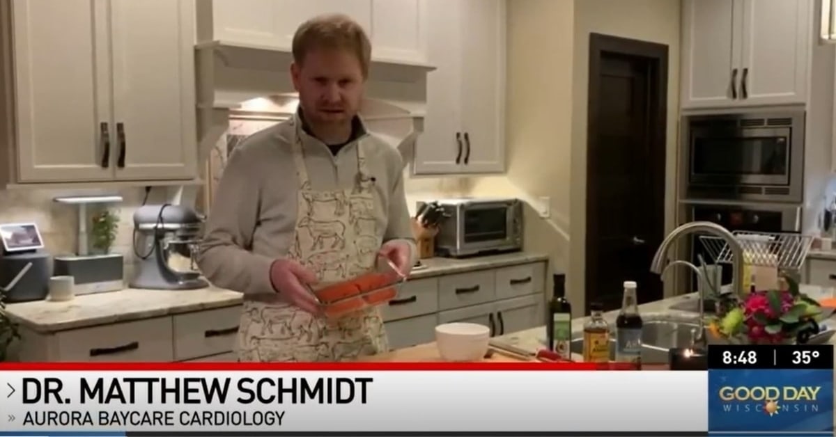 Dr. Matthew Schmidt, Aurora BayCare Cardiology cooks a healthy meal in his kitchen